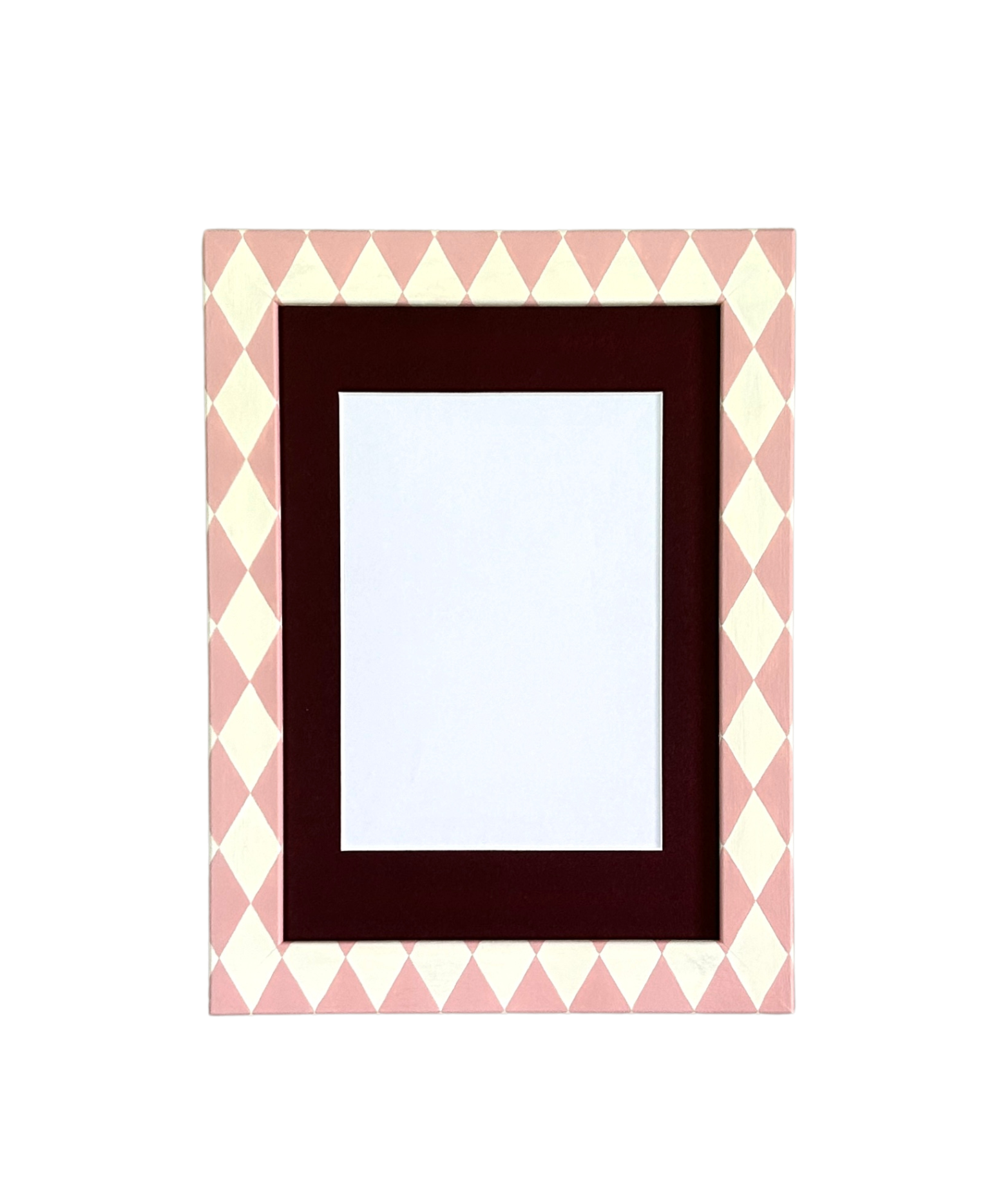 Rectangular picture frame with a pink and white chevron pattern border on a white background