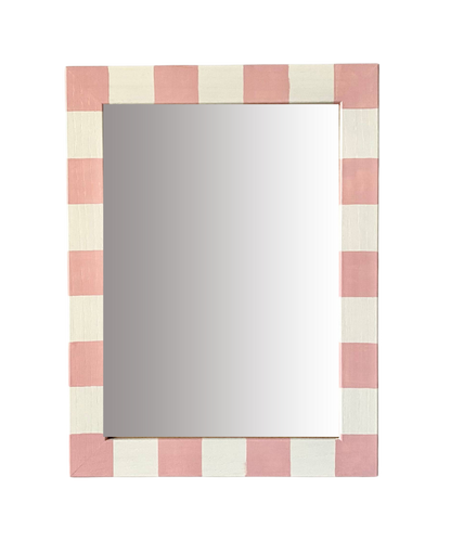 Rectangular mirror with a pink and white striped frame on a white background