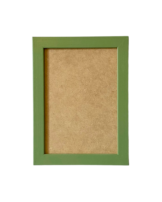 Green picture frame with a brown cardboard back on a white background