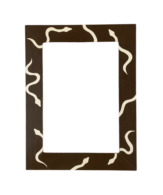 Rectangular frame with snake design on a white background