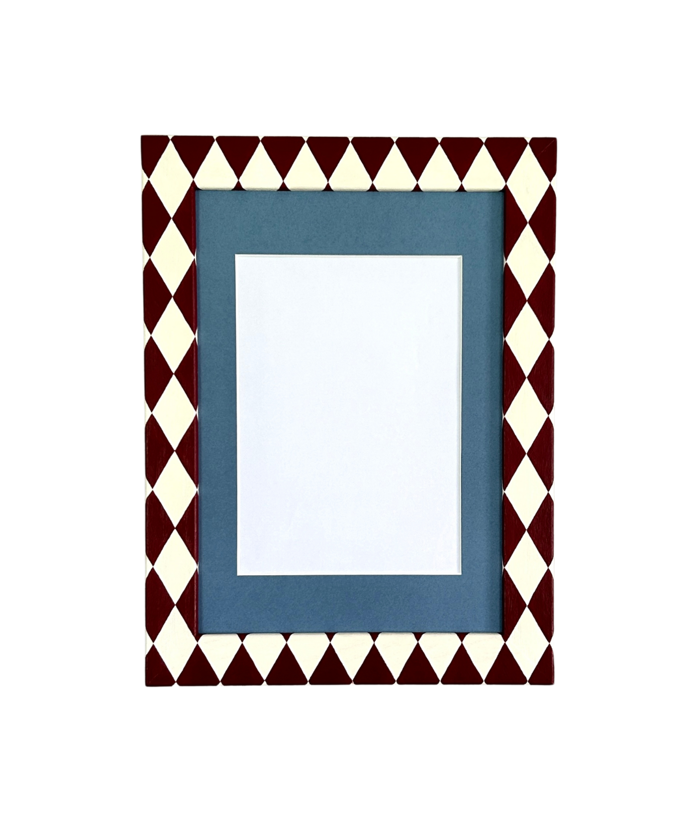 Decorative picture frame with a geometric pattern on a white background